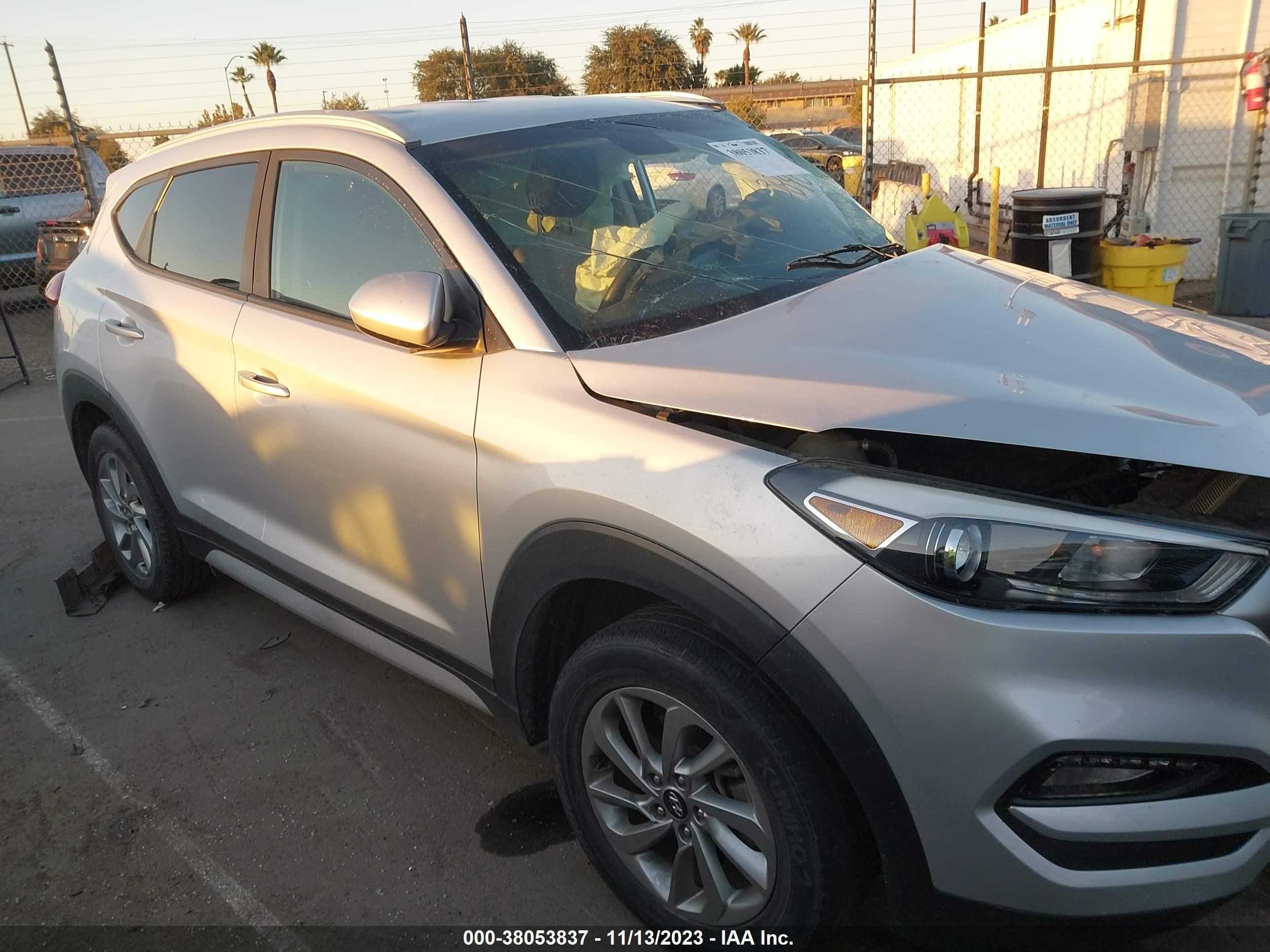 Photo 12 VIN: KM8J33A45JU736520 - HYUNDAI TUCSON 