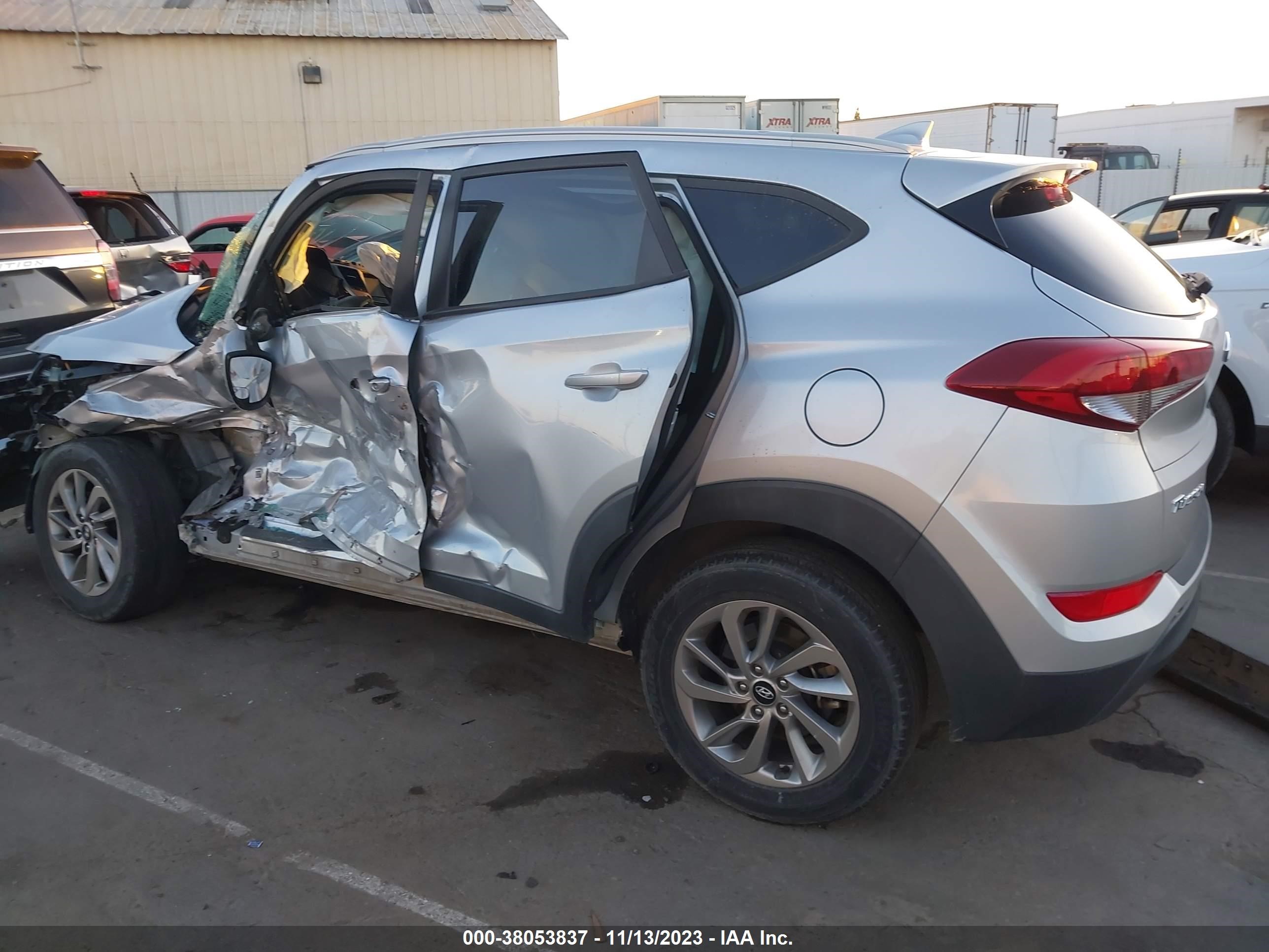 Photo 13 VIN: KM8J33A45JU736520 - HYUNDAI TUCSON 