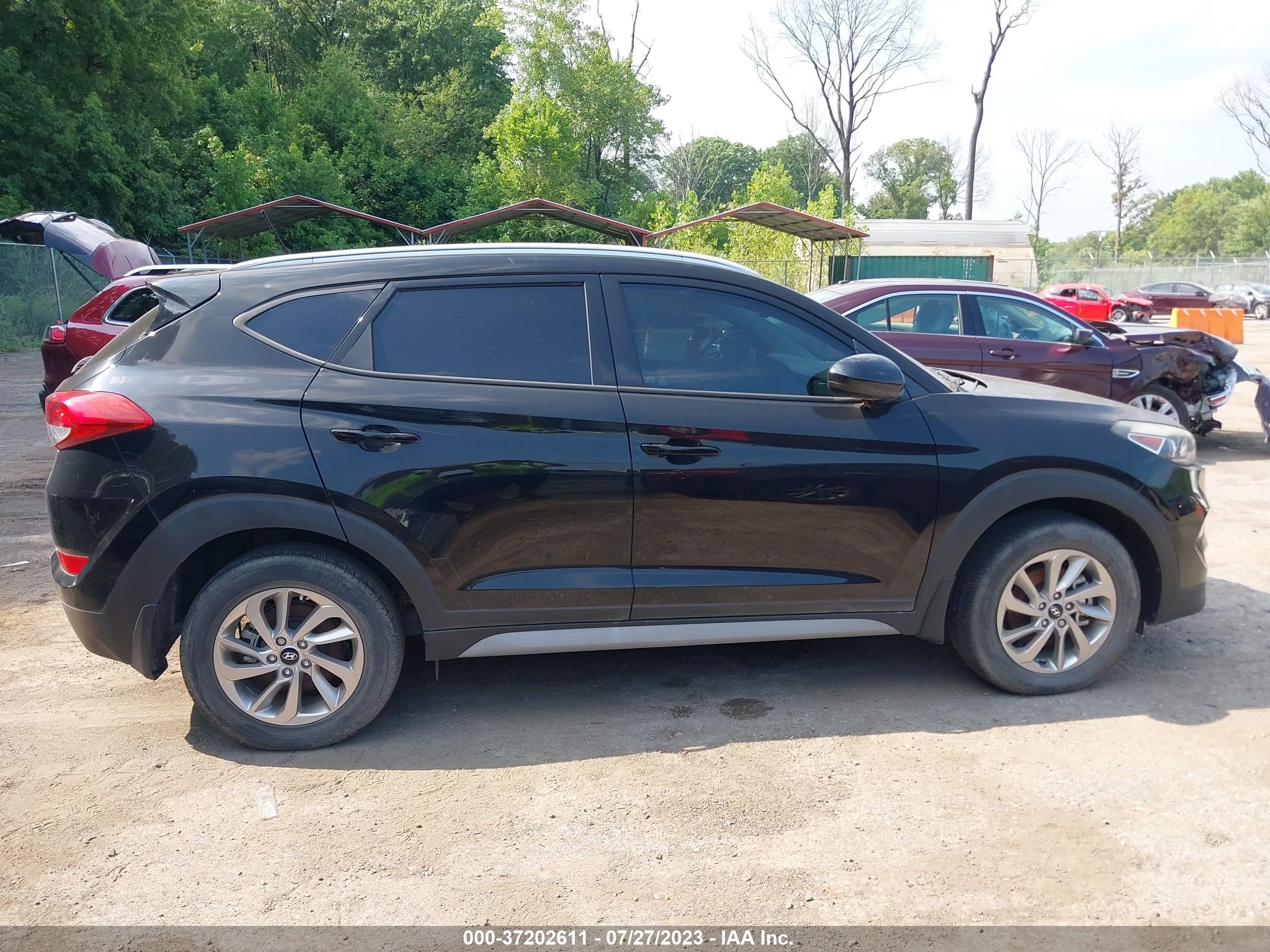 Photo 11 VIN: KM8J33A47HU368397 - HYUNDAI TUCSON 