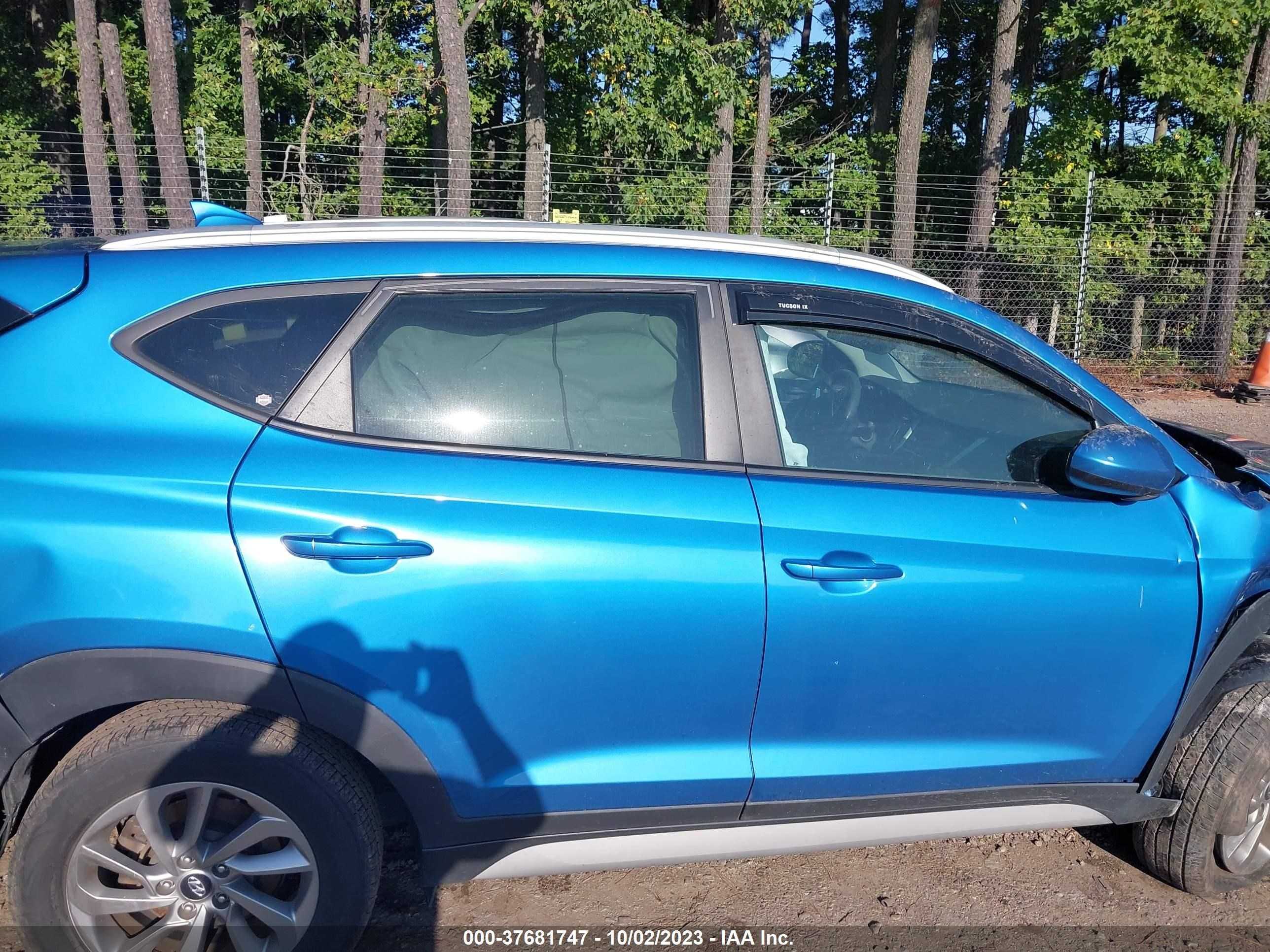 Photo 11 VIN: KM8J33A4XJU704758 - HYUNDAI TUCSON 