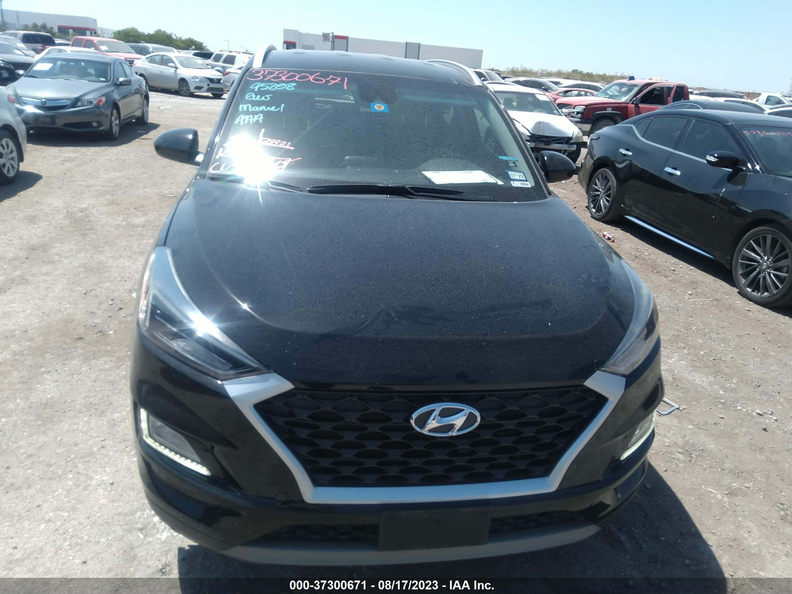 Photo 12 VIN: KM8J33ALXKU909473 - HYUNDAI TUCSON 