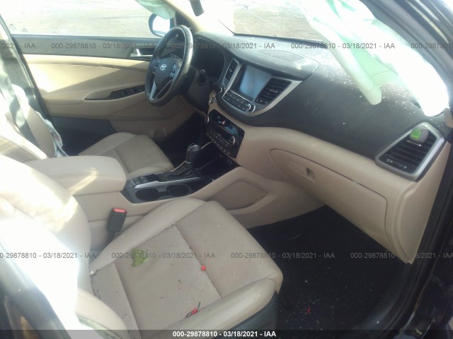 Photo 4 VIN: KM8J3CA20GU168538 - HYUNDAI TUCSON 