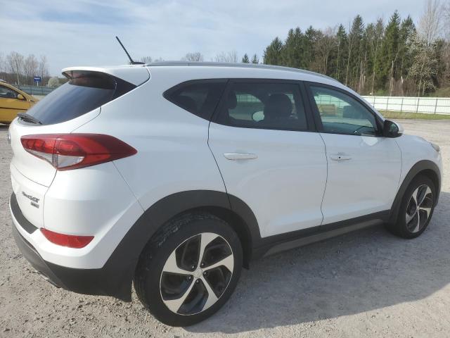 Photo 2 VIN: KM8J3CA20GU204079 - HYUNDAI TUCSON 