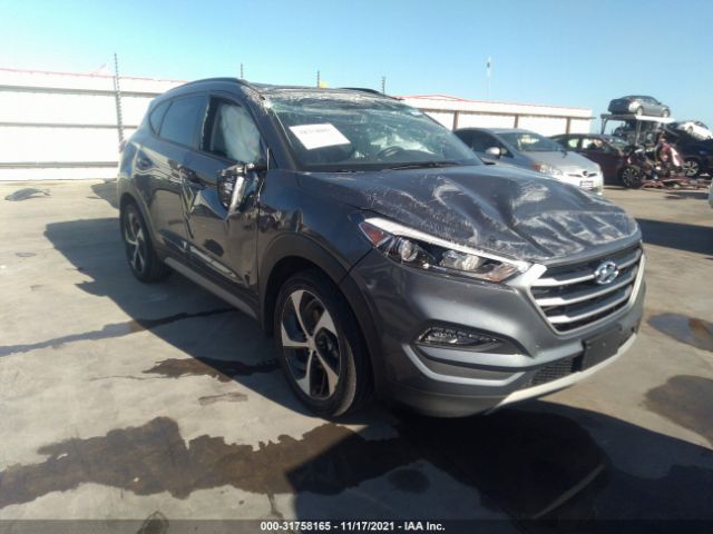 Photo 0 VIN: KM8J3CA21JU751904 - HYUNDAI TUCSON 