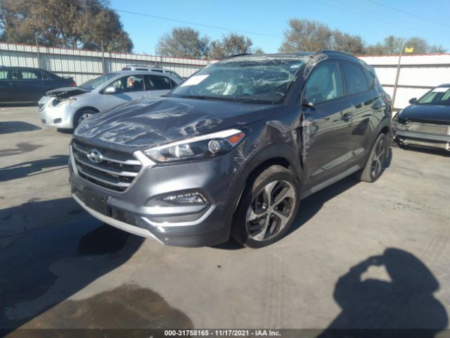 Photo 1 VIN: KM8J3CA21JU751904 - HYUNDAI TUCSON 