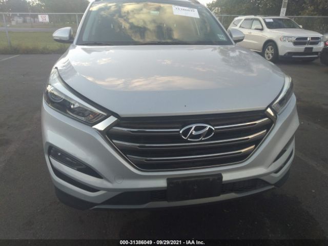 Photo 5 VIN: KM8J3CA22GU249606 - HYUNDAI TUCSON 