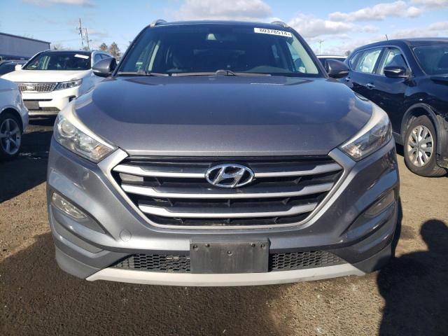 Photo 4 VIN: KM8J3CA22HU506135 - HYUNDAI TUCSON 