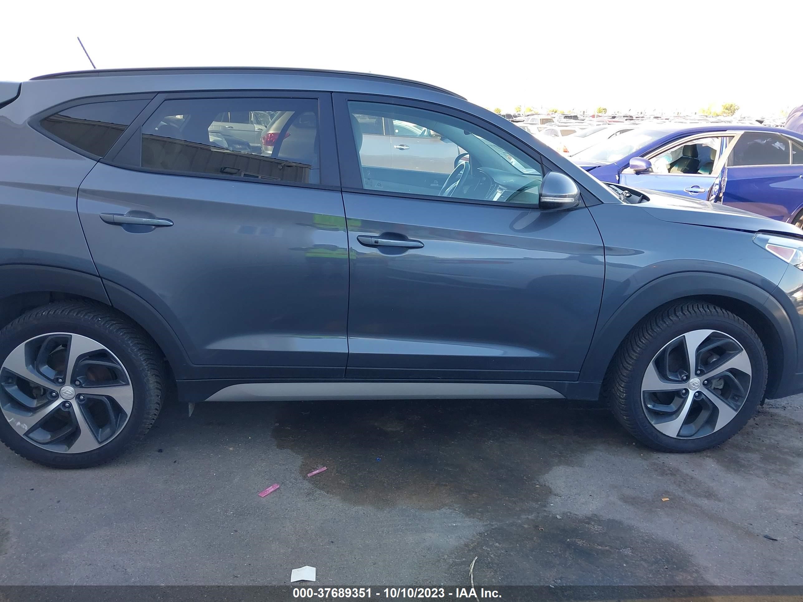 Photo 12 VIN: KM8J3CA22HU552189 - HYUNDAI TUCSON 