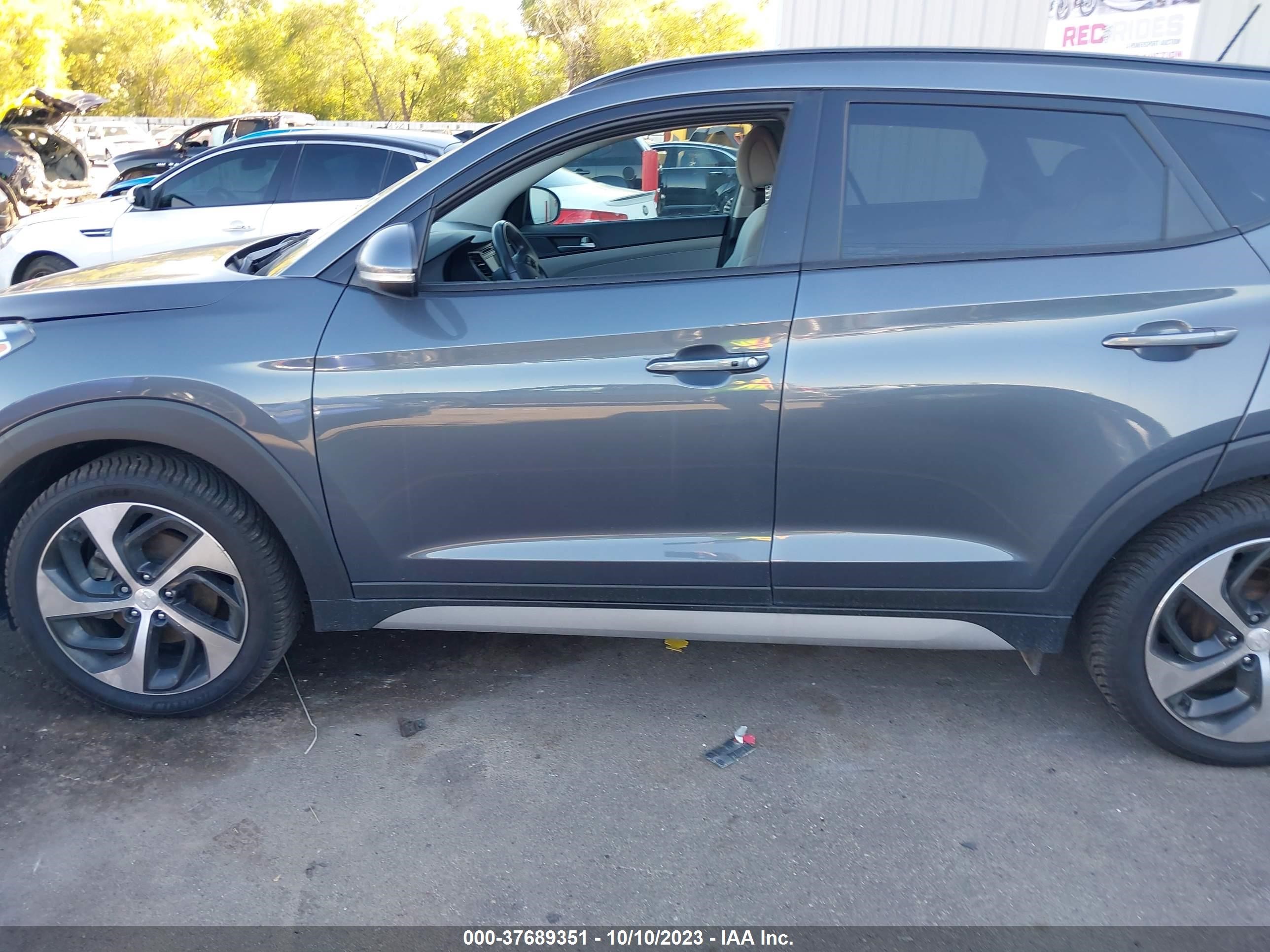 Photo 13 VIN: KM8J3CA22HU552189 - HYUNDAI TUCSON 