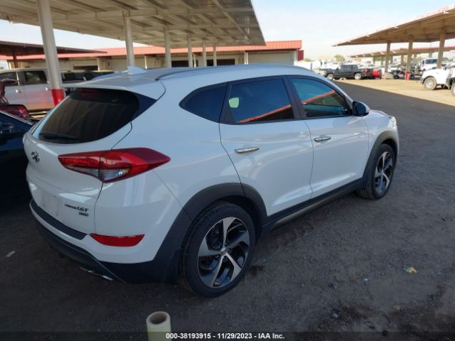 Photo 3 VIN: KM8J3CA23GU032890 - HYUNDAI TUCSON 