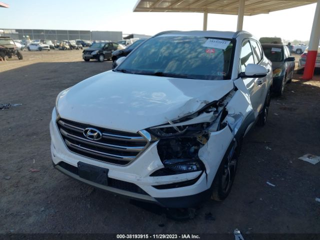 Photo 5 VIN: KM8J3CA23GU032890 - HYUNDAI TUCSON 