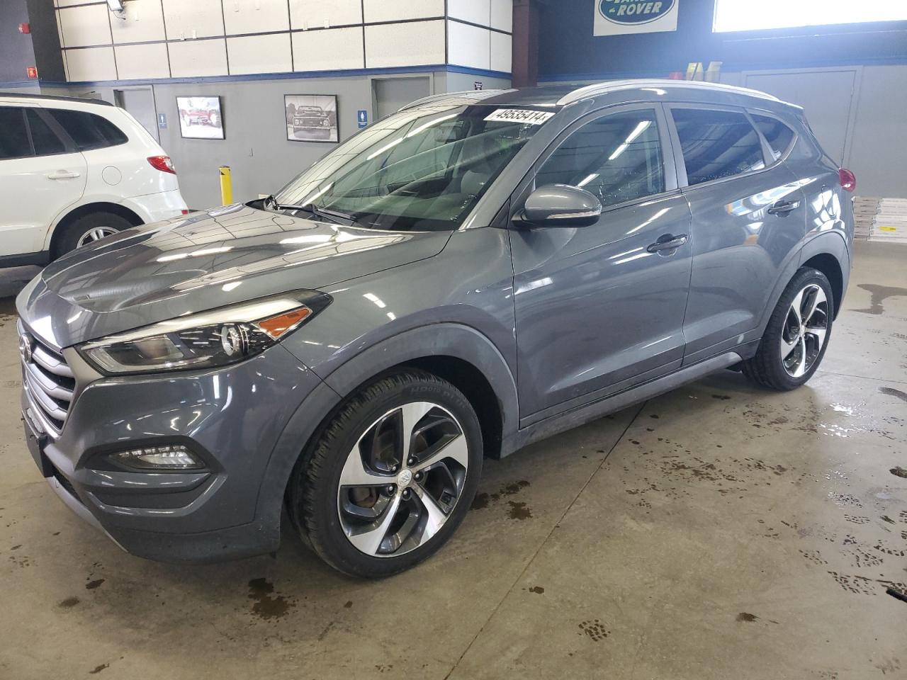 Photo 0 VIN: KM8J3CA23GU046983 - HYUNDAI TUCSON 