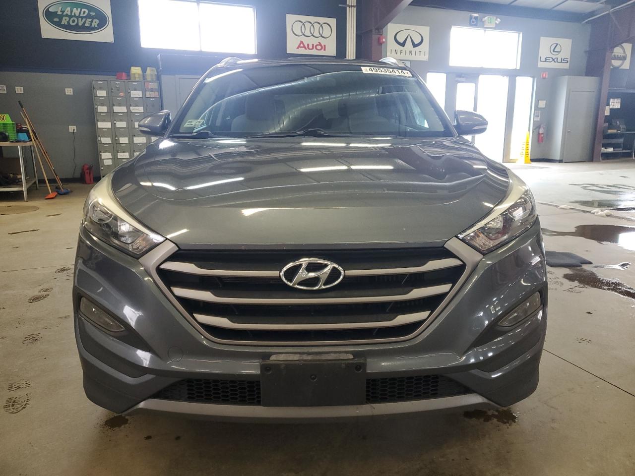 Photo 4 VIN: KM8J3CA23GU046983 - HYUNDAI TUCSON 