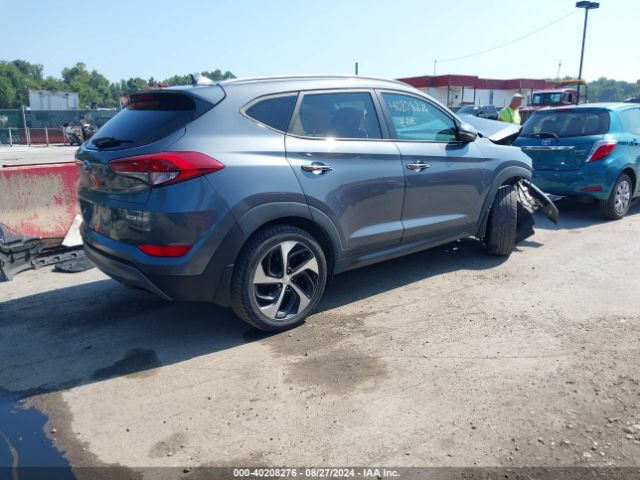 Photo 3 VIN: KM8J3CA23GU051990 - HYUNDAI TUCSON 