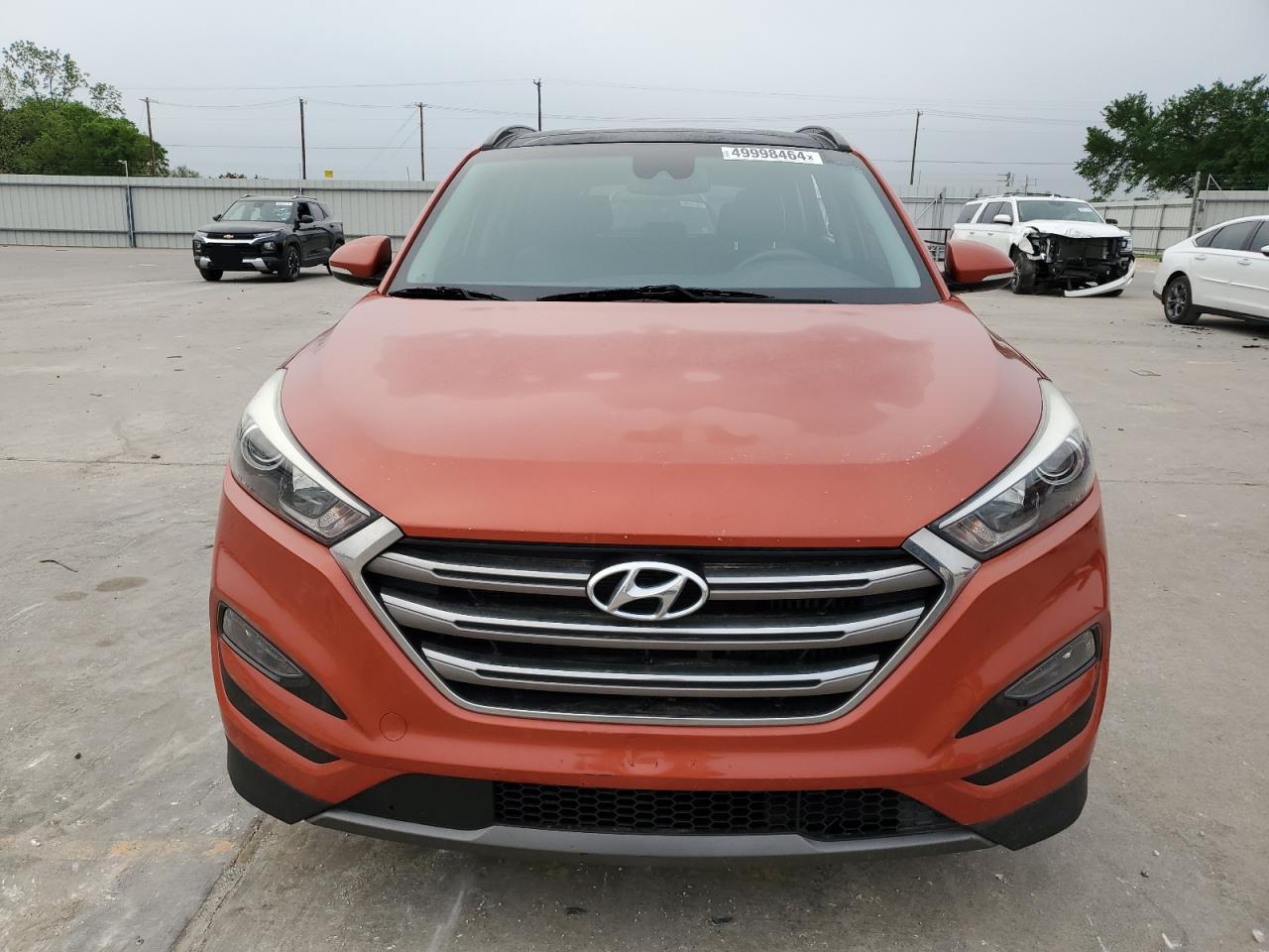 Photo 4 VIN: KM8J3CA23GU076033 - HYUNDAI TUCSON 