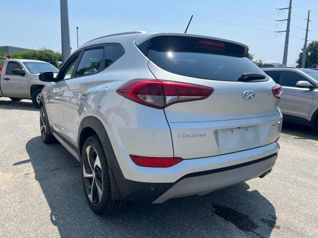 Photo 2 VIN: KM8J3CA23HU306154 - HYUNDAI TUCSON LIM 