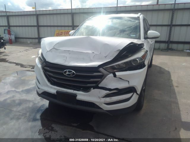 Photo 5 VIN: KM8J3CA24GU052646 - HYUNDAI TUCSON 