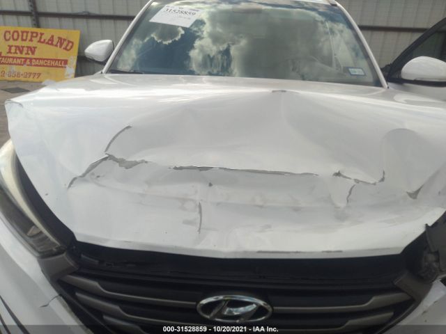 Photo 9 VIN: KM8J3CA24GU052646 - HYUNDAI TUCSON 