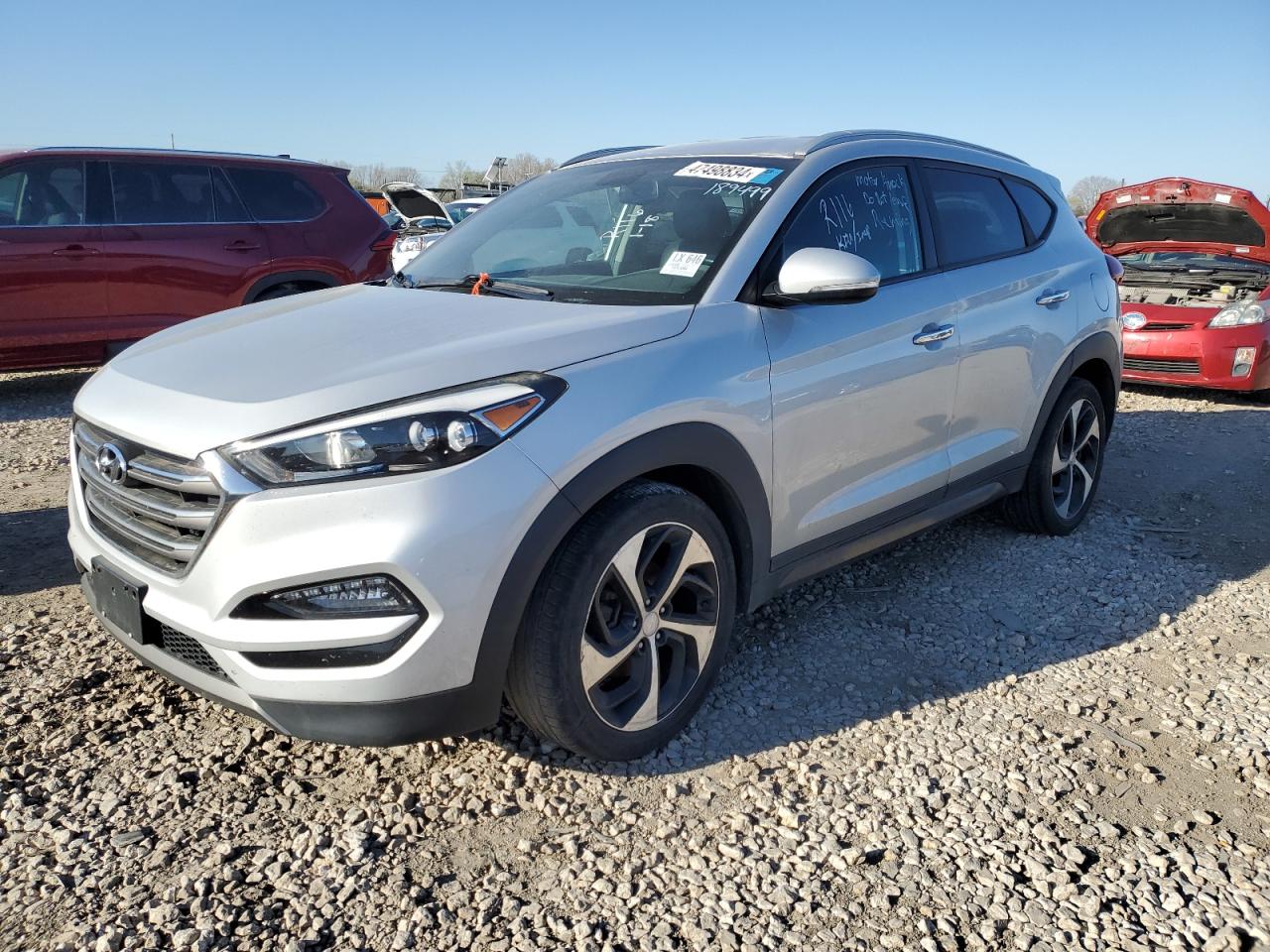 Photo 0 VIN: KM8J3CA24GU054252 - HYUNDAI TUCSON 