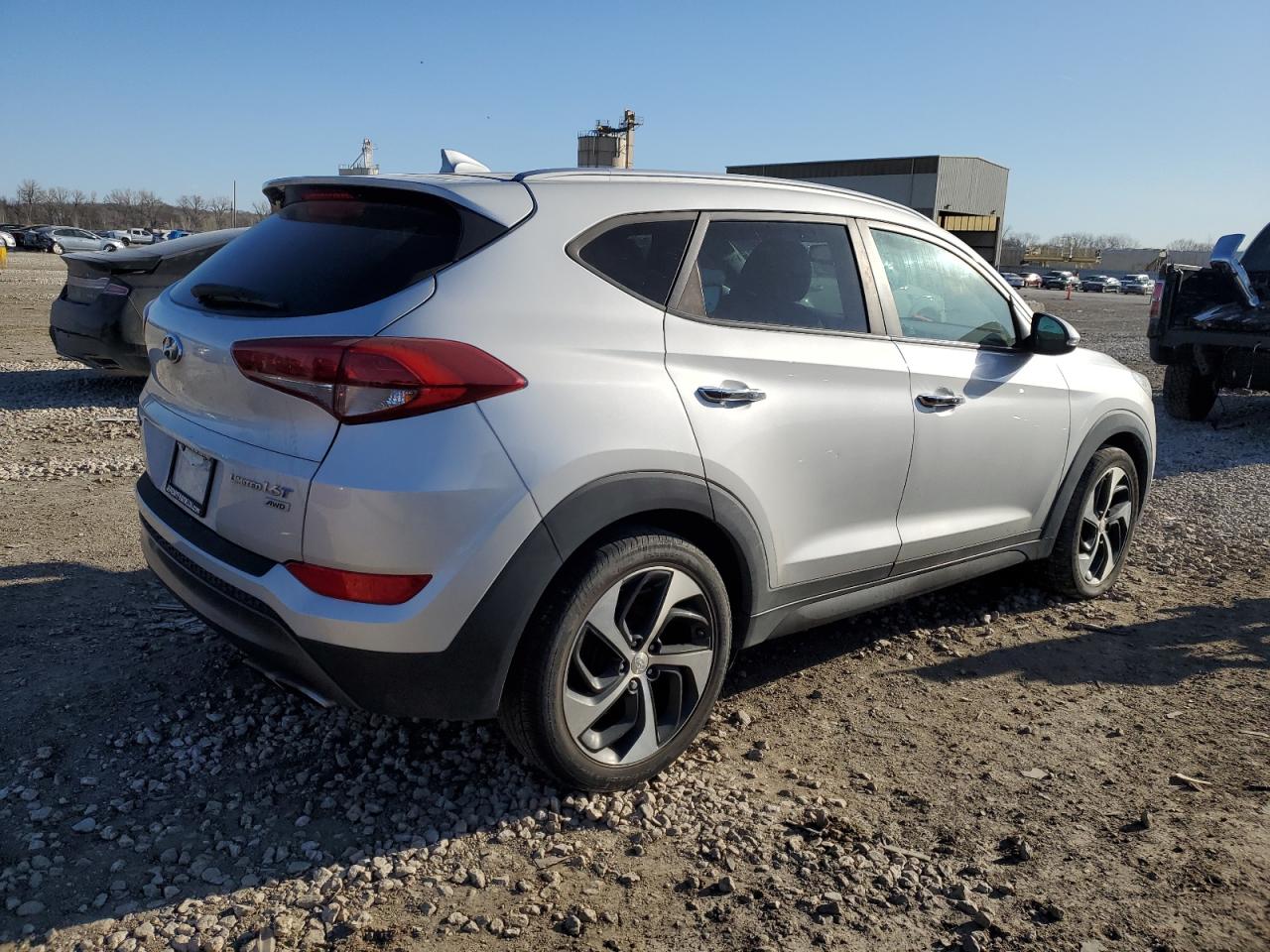 Photo 2 VIN: KM8J3CA24GU054252 - HYUNDAI TUCSON 