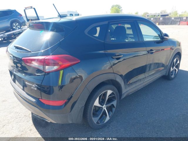 Photo 3 VIN: KM8J3CA24GU062688 - HYUNDAI TUCSON 