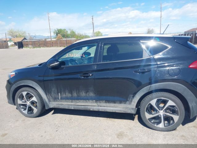 Photo 5 VIN: KM8J3CA24GU062688 - HYUNDAI TUCSON 