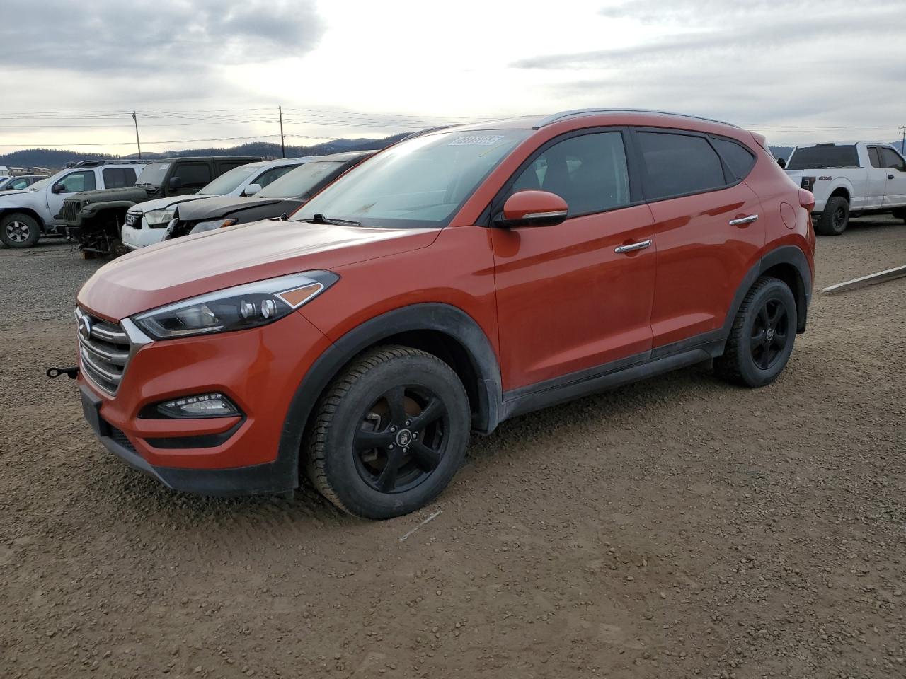 Photo 0 VIN: KM8J3CA24GU085131 - HYUNDAI TUCSON 