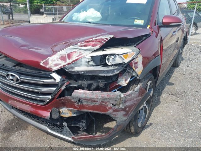 Photo 5 VIN: KM8J3CA24GU099322 - HYUNDAI TUCSON 