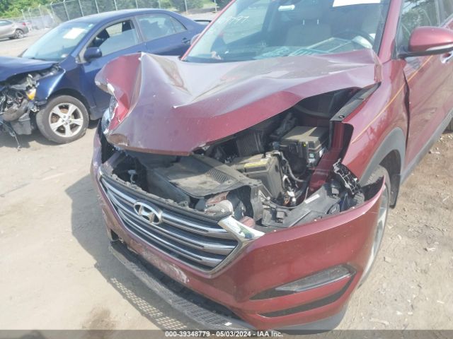 Photo 5 VIN: KM8J3CA24GU114529 - HYUNDAI TUCSON 