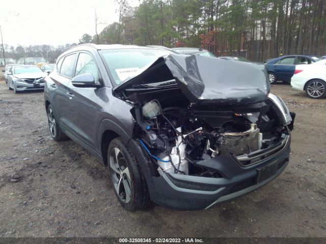 Photo 0 VIN: KM8J3CA24GU183706 - HYUNDAI TUCSON 