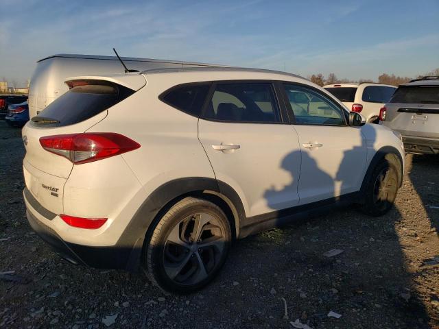 Photo 2 VIN: KM8J3CA24GU224030 - HYUNDAI TUCSON 