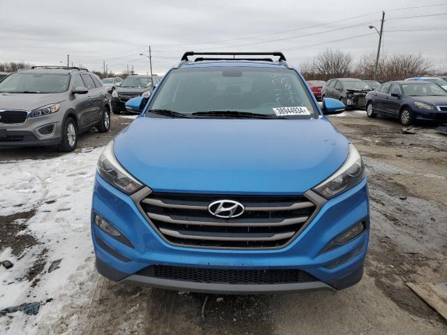 Photo 4 VIN: KM8J3CA24GU231639 - HYUNDAI TUCSON 