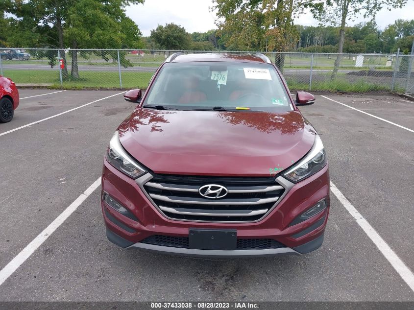 Photo 11 VIN: KM8J3CA24GU246285 - HYUNDAI TUCSON 