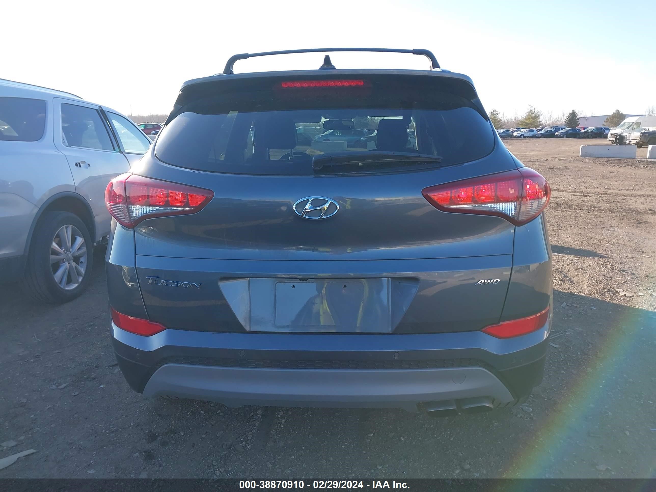 Photo 15 VIN: KM8J3CA24JU754814 - HYUNDAI TUCSON 