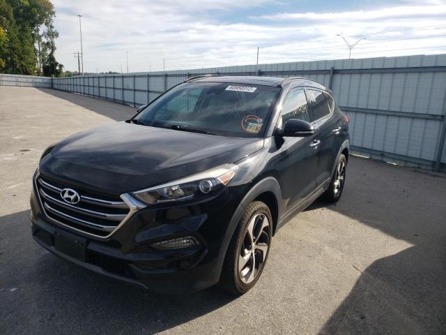 Photo 1 VIN: KM8J3CA25GU043051 - HYUNDAI TUCSON LIM 