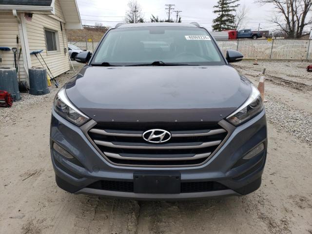 Photo 4 VIN: KM8J3CA25GU125846 - HYUNDAI TUCSON 