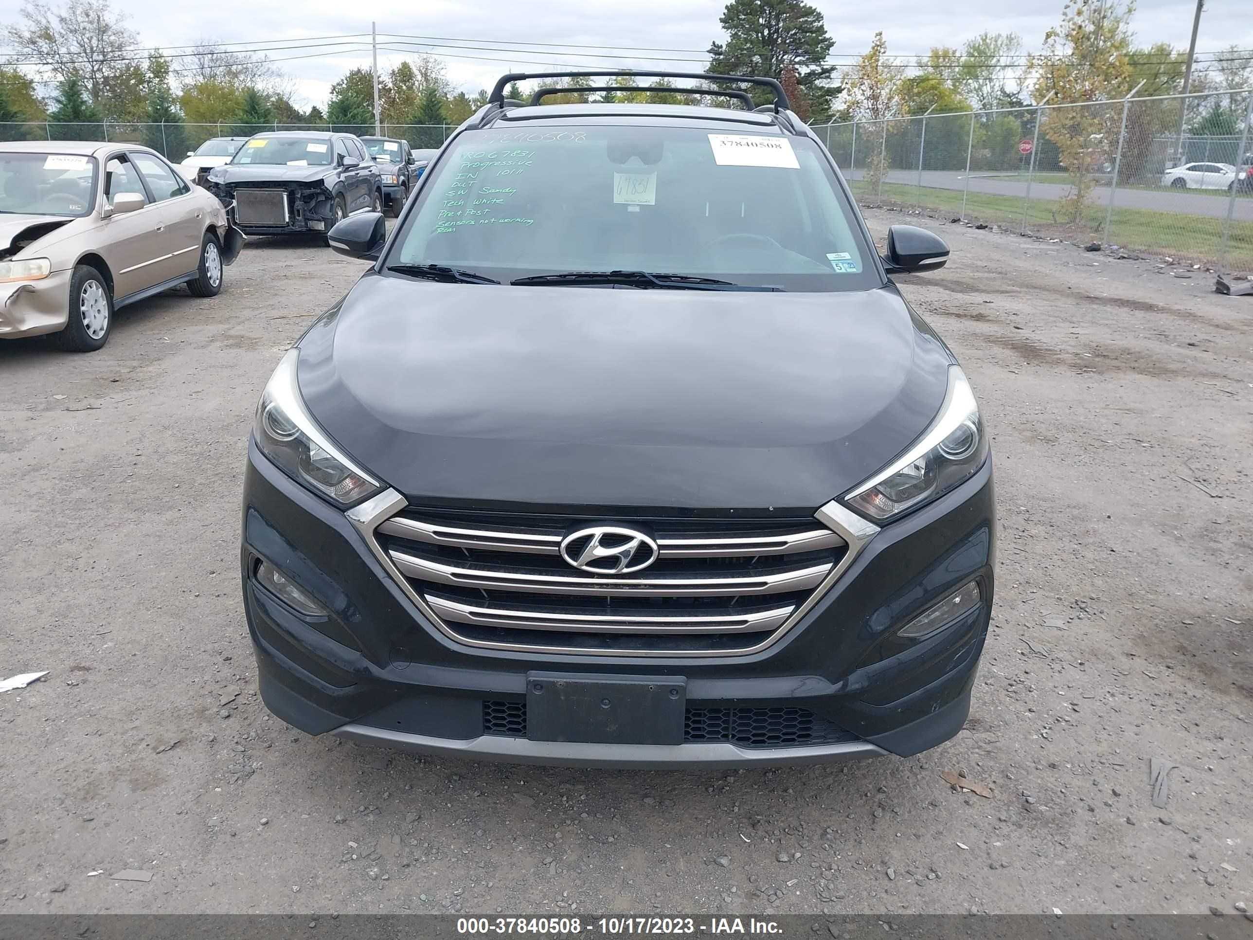 Photo 11 VIN: KM8J3CA25GU262334 - HYUNDAI TUCSON 