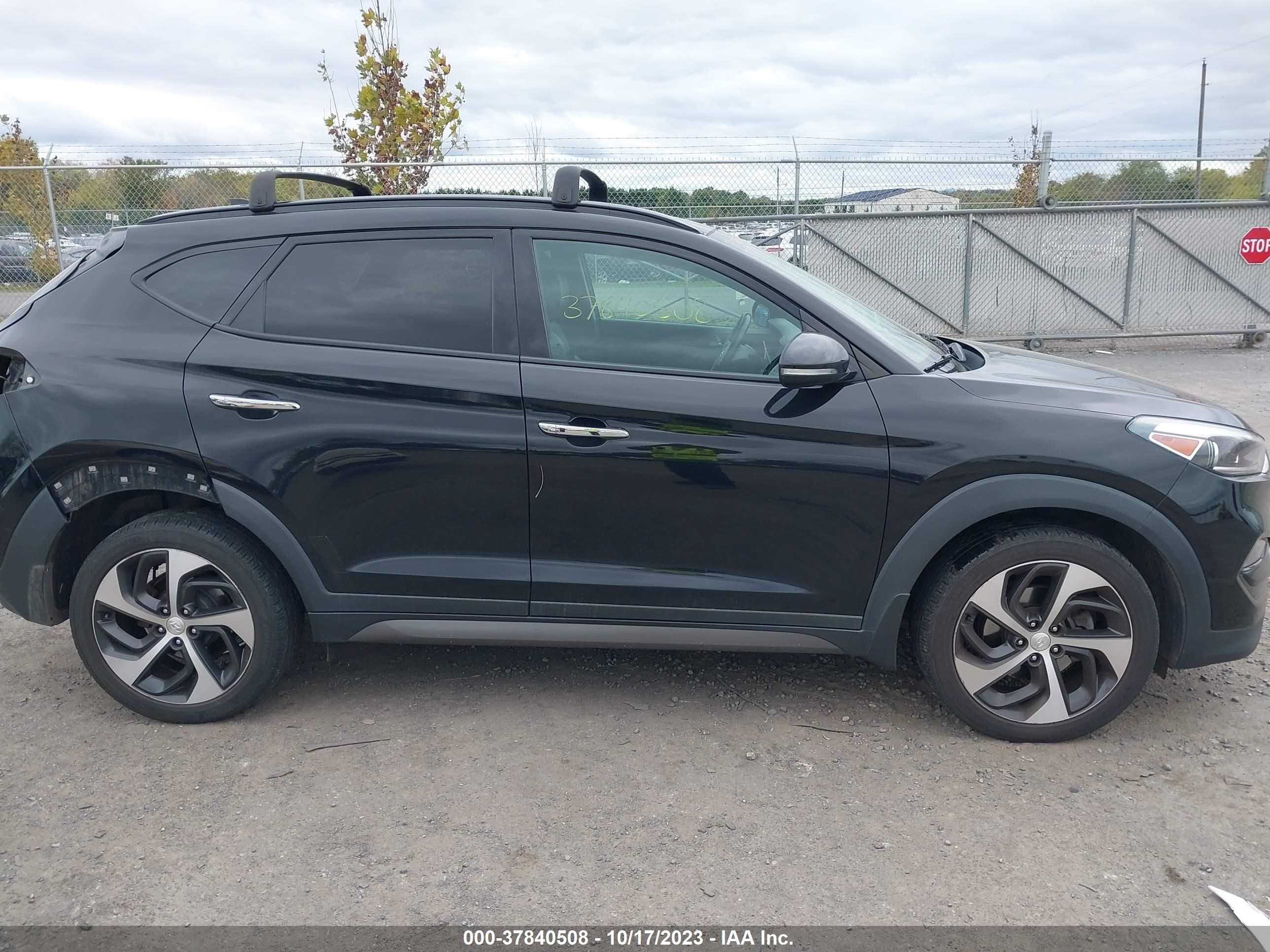 Photo 12 VIN: KM8J3CA25GU262334 - HYUNDAI TUCSON 