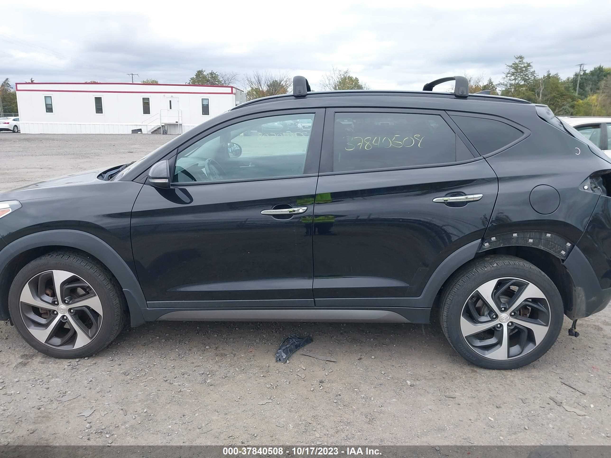 Photo 13 VIN: KM8J3CA25GU262334 - HYUNDAI TUCSON 