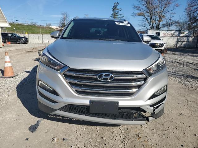 Photo 4 VIN: KM8J3CA25HU311128 - HYUNDAI TUCSON 