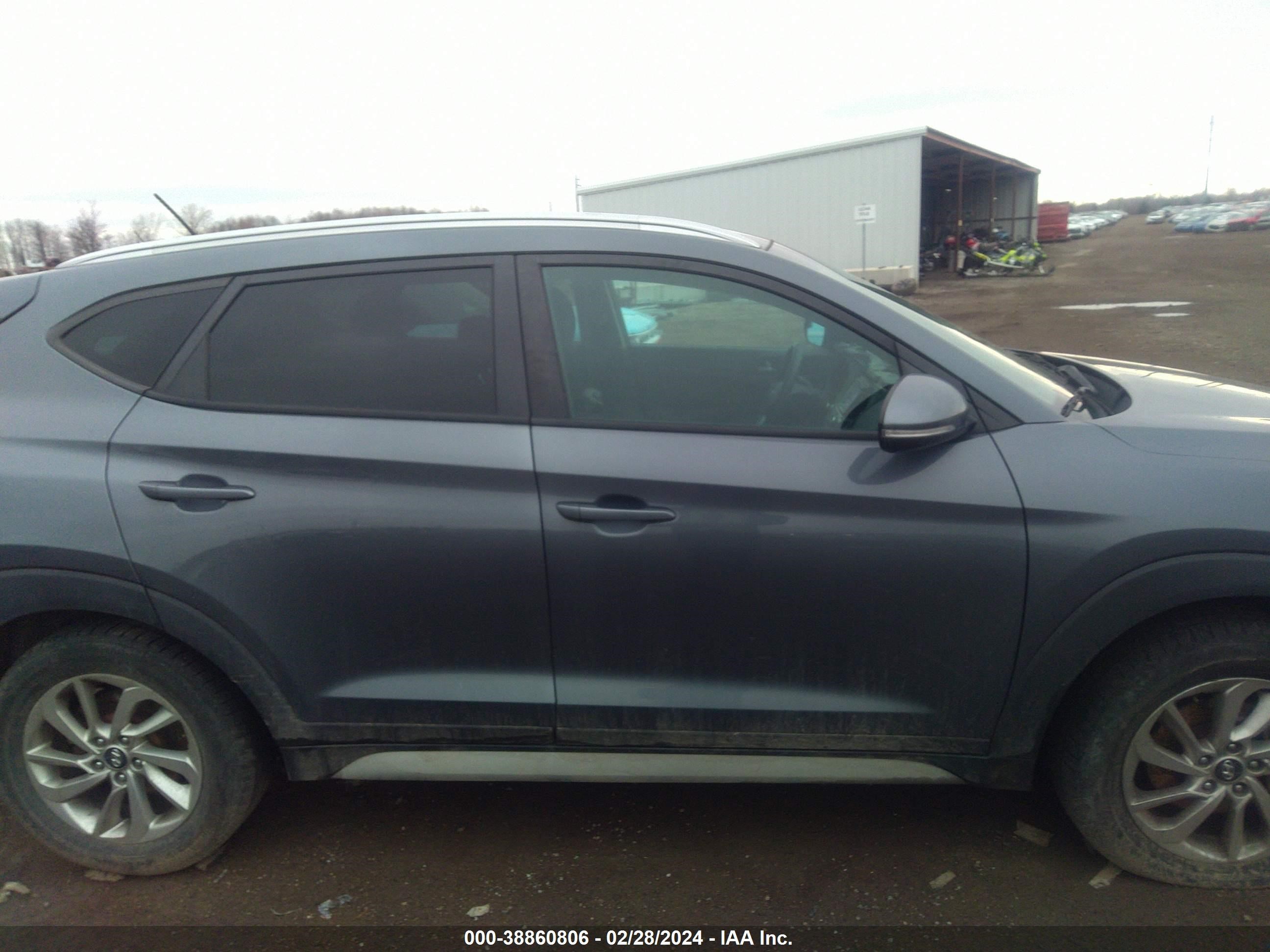 Photo 12 VIN: KM8J3CA25HU371233 - HYUNDAI TUCSON 