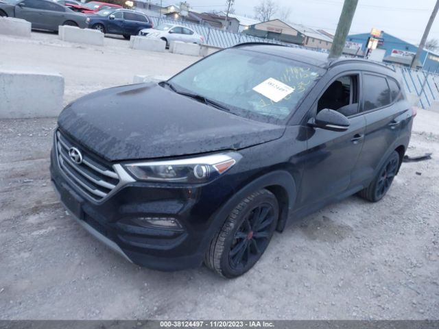 Photo 1 VIN: KM8J3CA25HU444634 - HYUNDAI TUCSON 