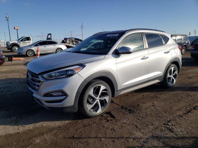 Photo 0 VIN: KM8J3CA25JU603884 - HYUNDAI TUCSON 