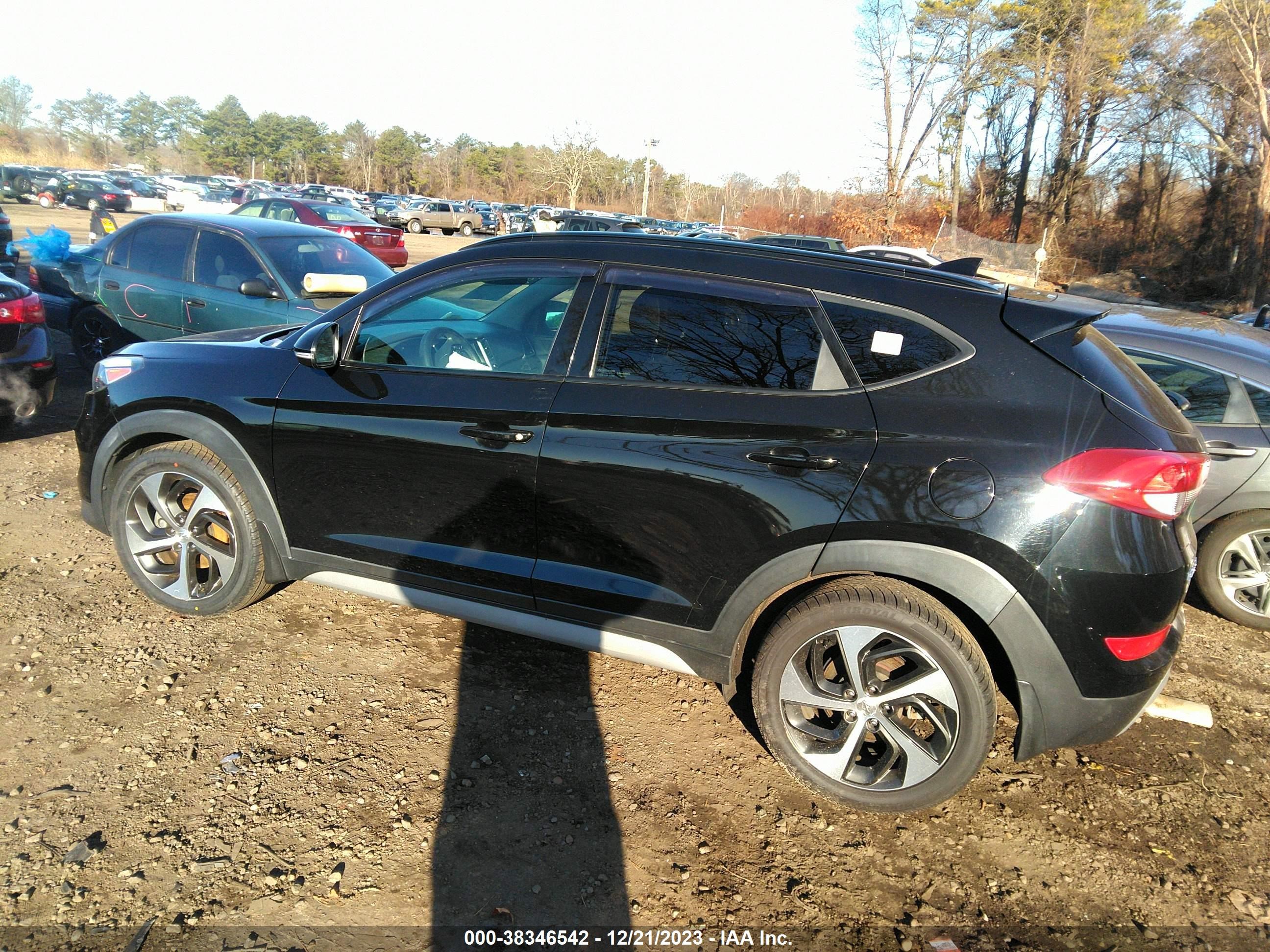 Photo 12 VIN: KM8J3CA25JU678228 - HYUNDAI TUCSON 