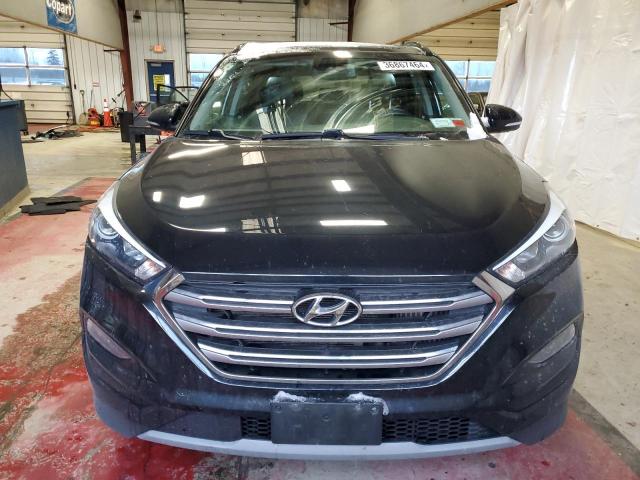 Photo 4 VIN: KM8J3CA25JU724589 - HYUNDAI TUCSON 