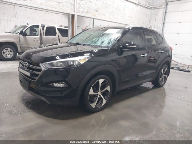 Photo 1 VIN: KM8J3CA26GU031636 - HYUNDAI TUCSON 