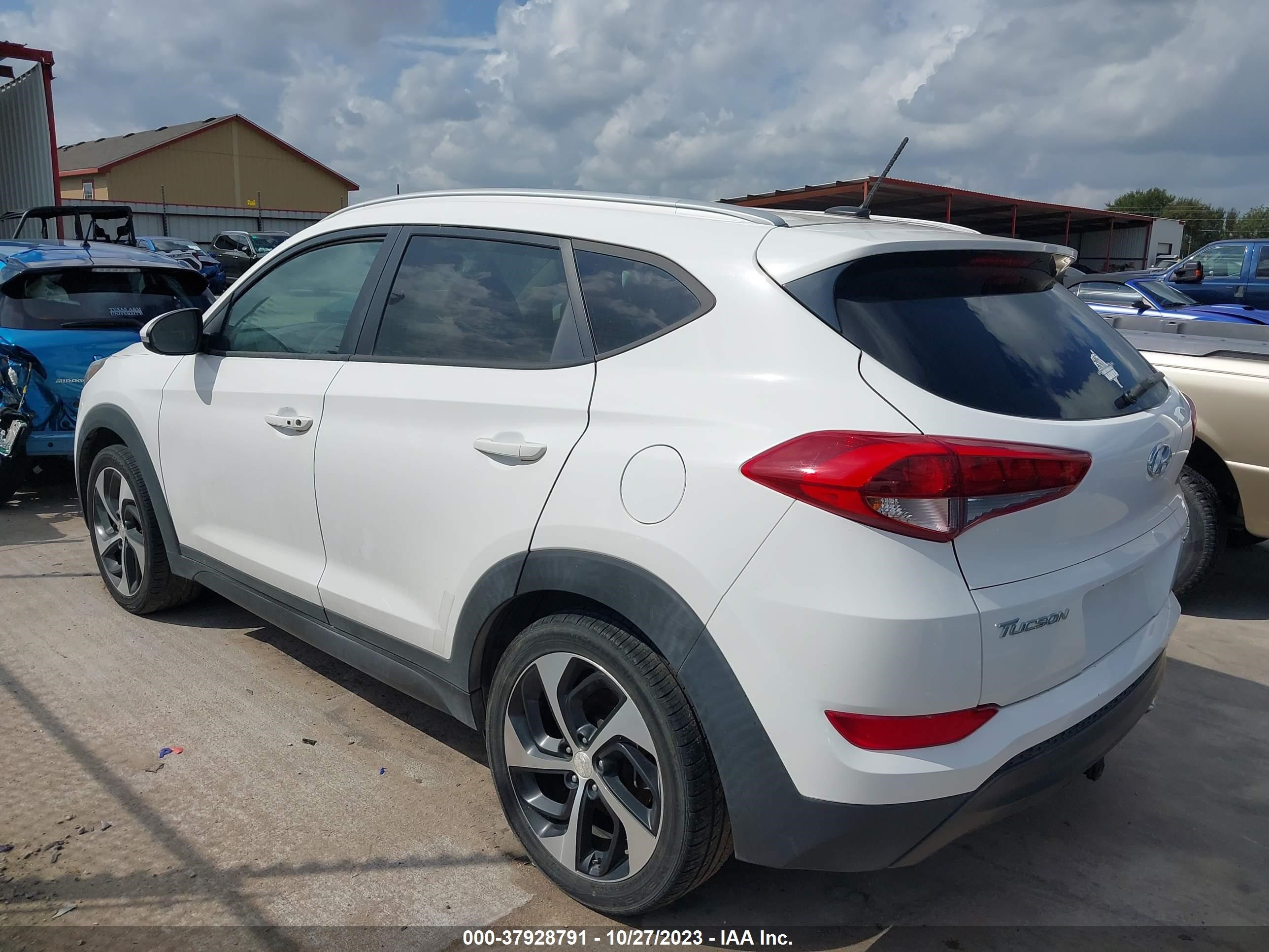 Photo 2 VIN: KM8J3CA26GU052597 - HYUNDAI TUCSON 