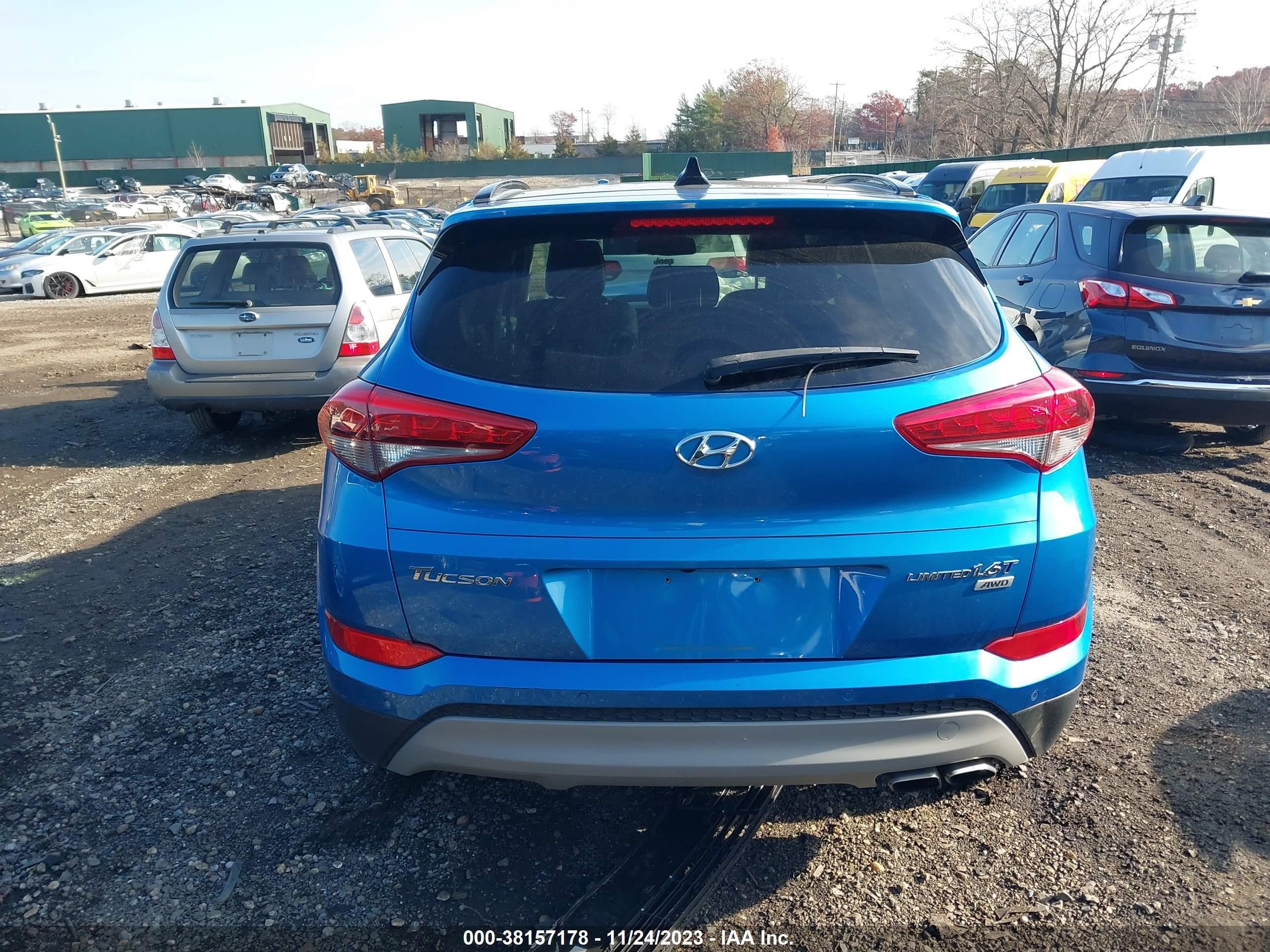 Photo 15 VIN: KM8J3CA26JU702469 - HYUNDAI TUCSON 