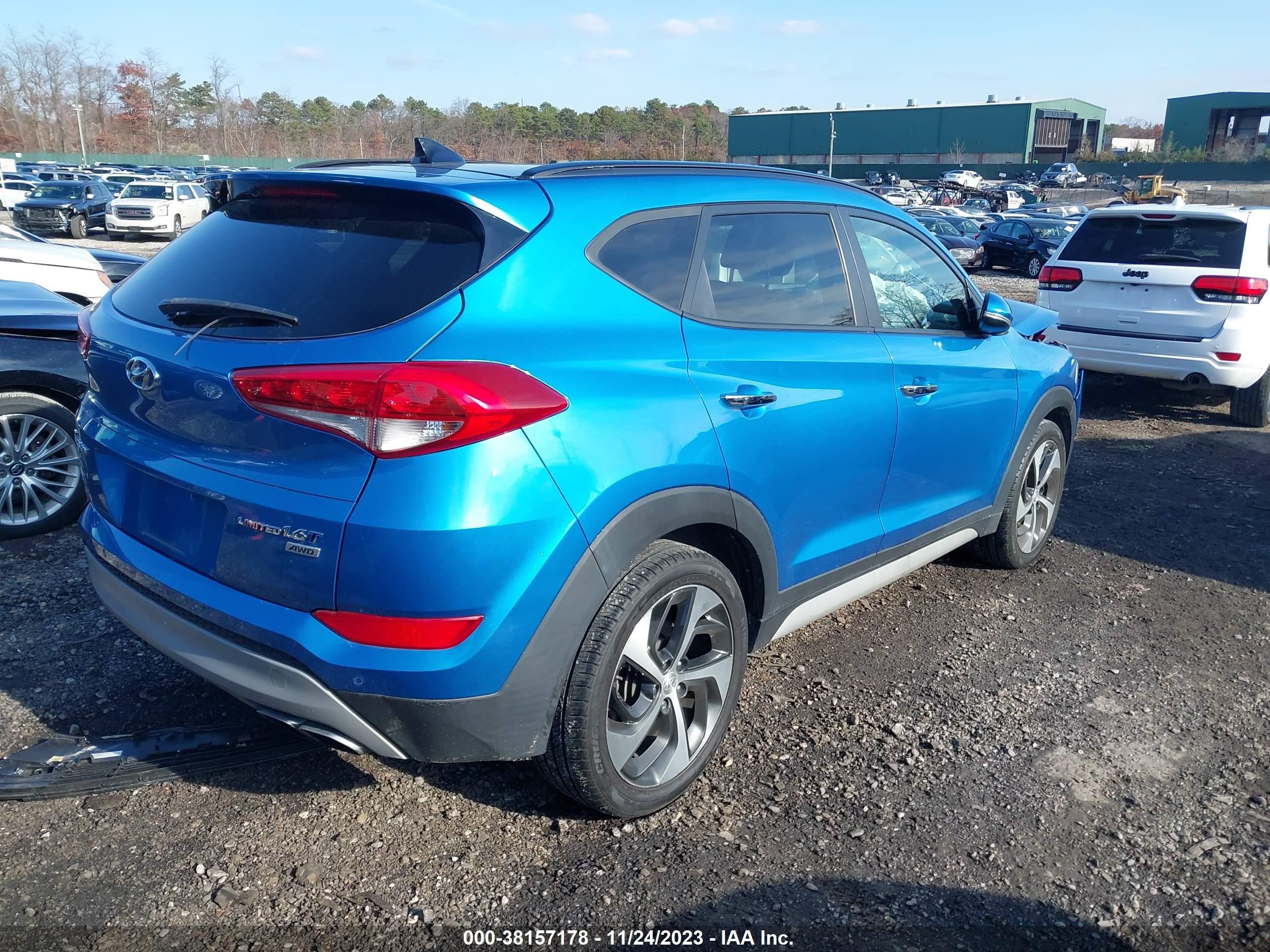 Photo 3 VIN: KM8J3CA26JU702469 - HYUNDAI TUCSON 