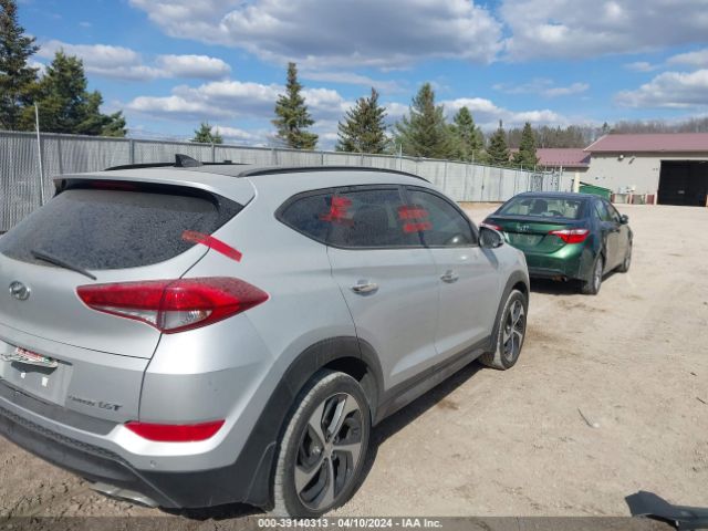 Photo 3 VIN: KM8J3CA27GU036733 - HYUNDAI TUCSON 